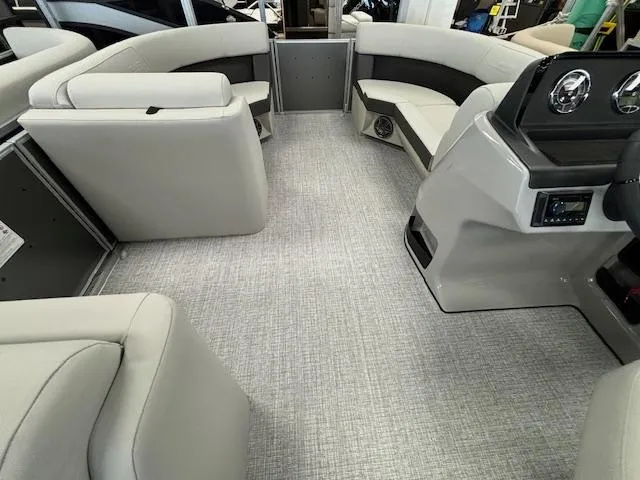 Slide: The Image of 2024 Harris CRUISER 190 CW interior with spacious seating and modern dashboard. - 18