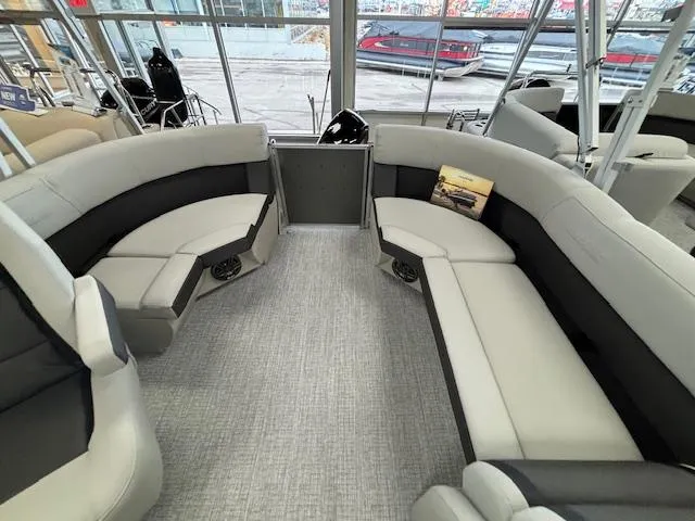 Slide: The Image of 2024 Harris CRUISER 190 CW pontoon boat interior with spacious seating and modern design. - 7
