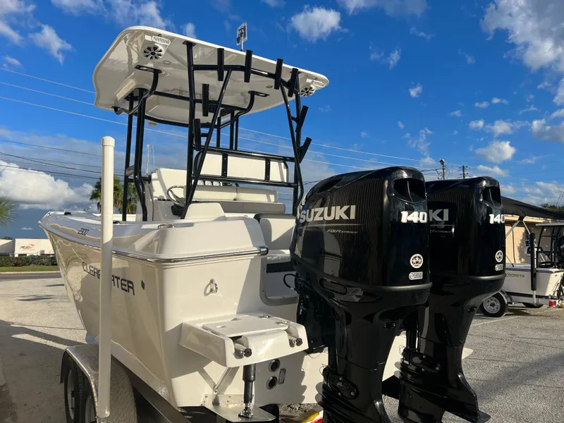 Slide: The Image of 2022 Clearwater 2300 boat with dual Suzuki 140 outboard motors. - 3