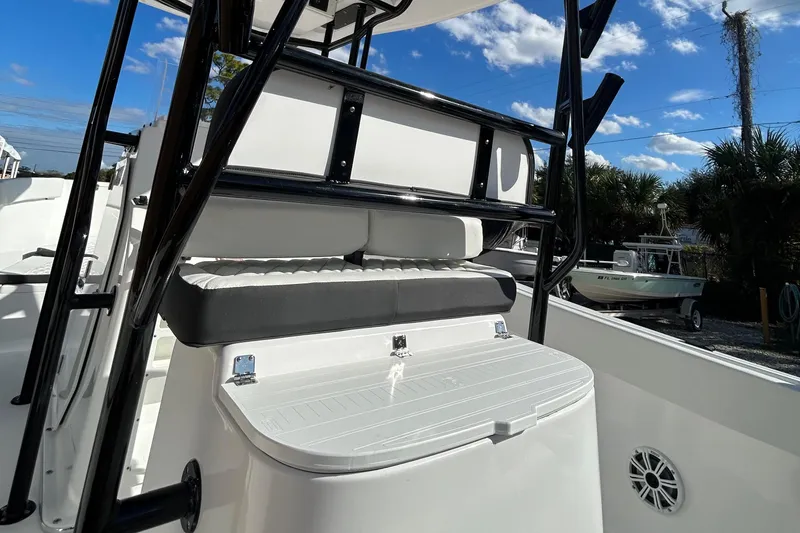 Slide: The Image of 2022 Clearwater 2300 boat interior with seating and storage. - 30