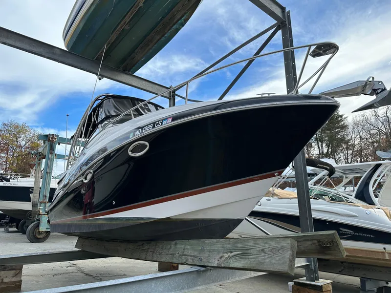 Slide: The Image of 2007 Four Winns 258 Vista boat in dry dock storage. - 0