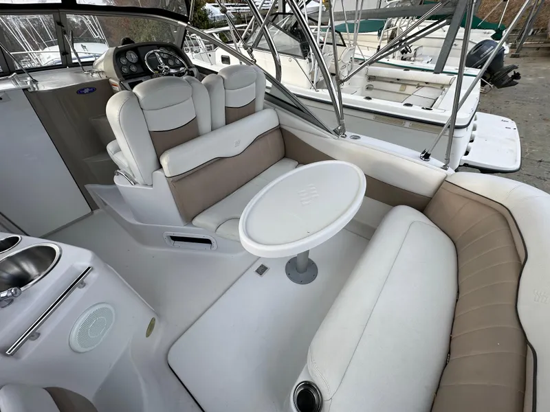 Slide: The Image of 2007 Four Winns 258 Vista boat interior with seating and helm. - 10