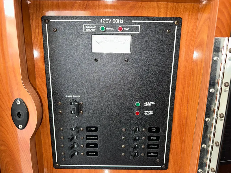 Slide: The Image of Electrical control panel of a 2007 Four Winns 258 Vista boat. - 29