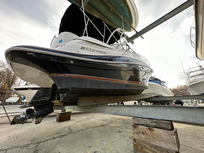 Slide: The Image of 2007 Four Winns 258 Vista boat on dry dock for maintenance. - 33