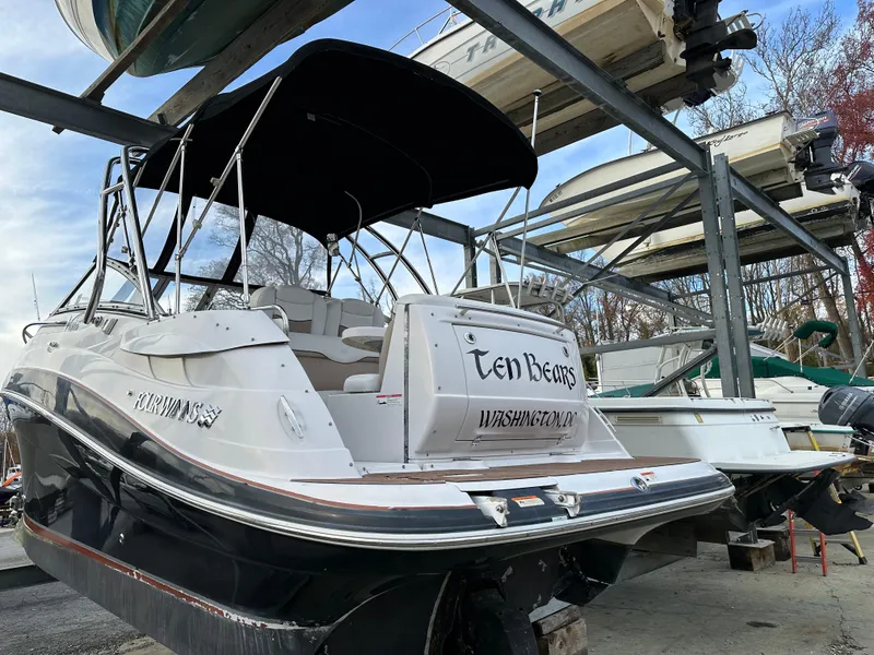 Slide: The Image of 2007 Four Winns 258 Vista boat named Ten Bears in dry dock storage. - 7
