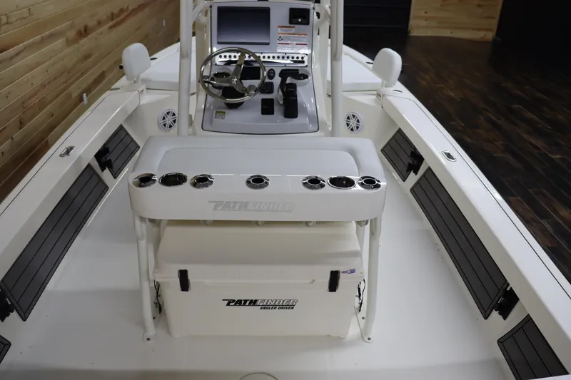 Slide: The Image of 2024 Pathfinder 2200 TRS boat interior with console and seating. - 18
