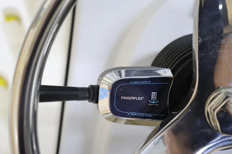 Slide: The Image of Close-up of 2024 Pathfinder 2200 TRS boat steering wheel with FingerFlex control. - 22