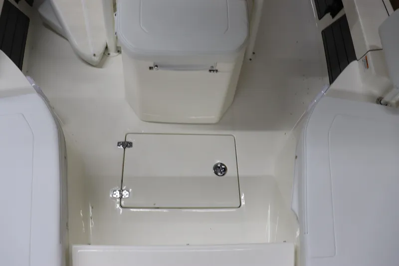 Slide: The Image of 2024 Pathfinder 2200 TRS boat interior with storage compartments. - 29