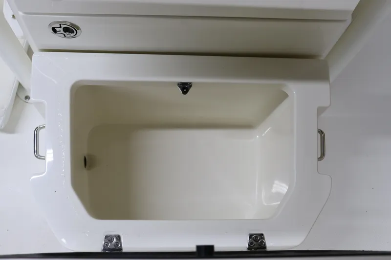 Slide: The Image of 2024 Pathfinder 2200 TRS boat storage compartment, white interior, top view. - 31