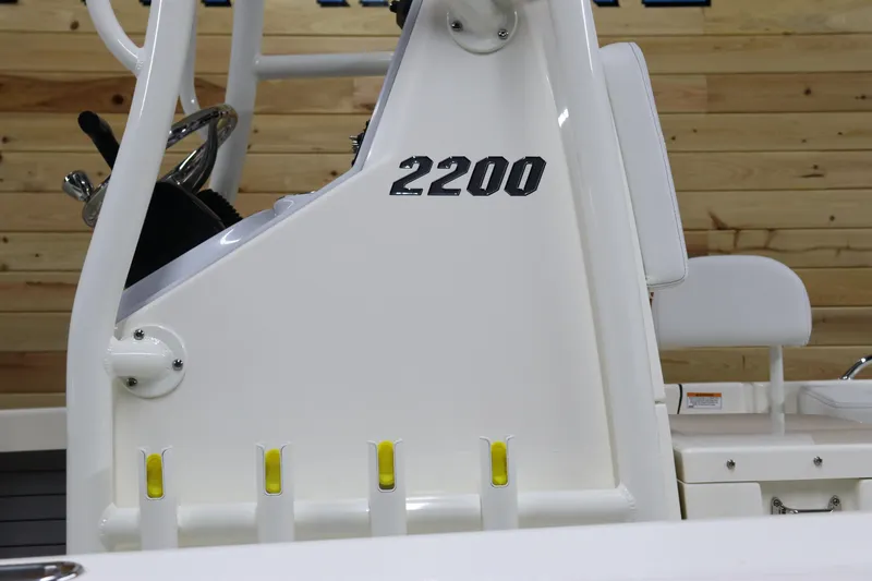 Slide: The Image of 2024 Pathfinder 2200 TRS boat console with rod holders. - 5