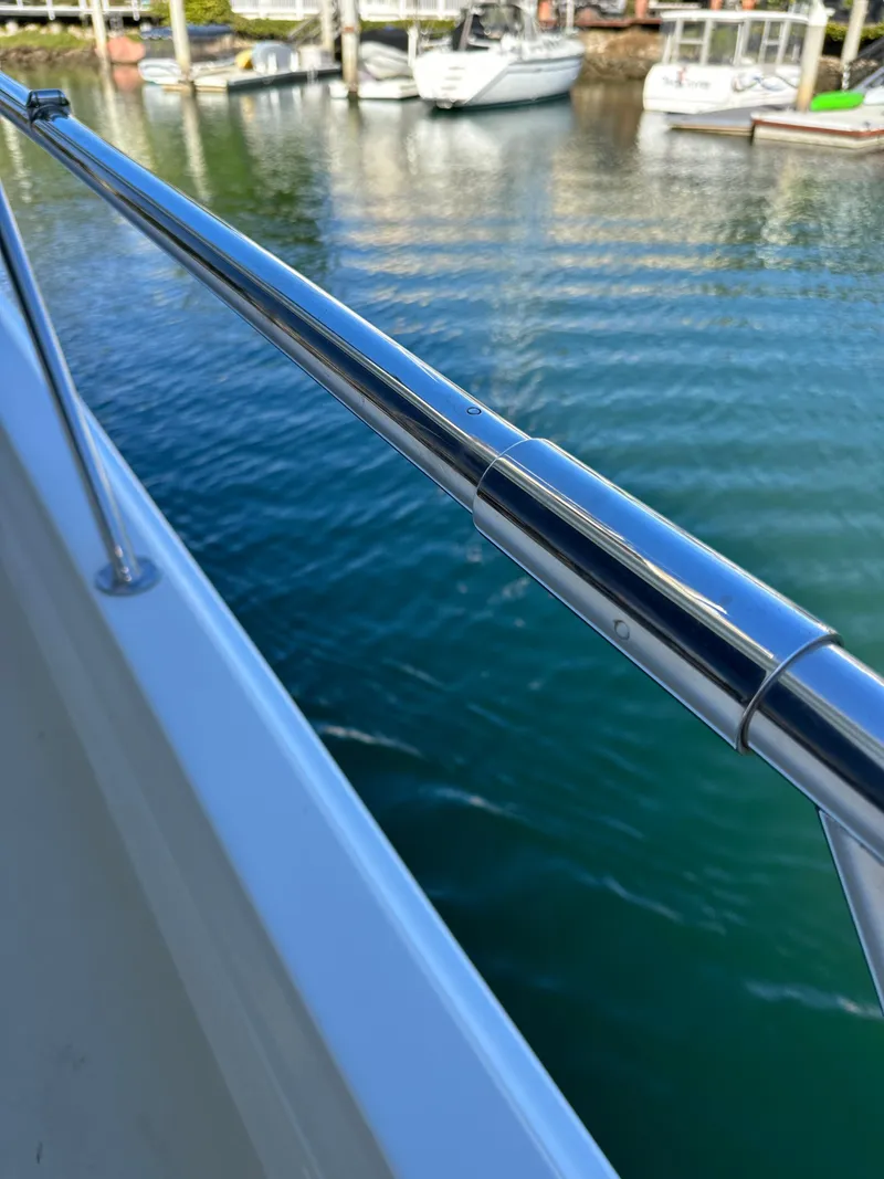 Slide: The Image of Close-up of 2009 Little Hoquiam 68 Long Range Sportfisher railing by the water. - 14