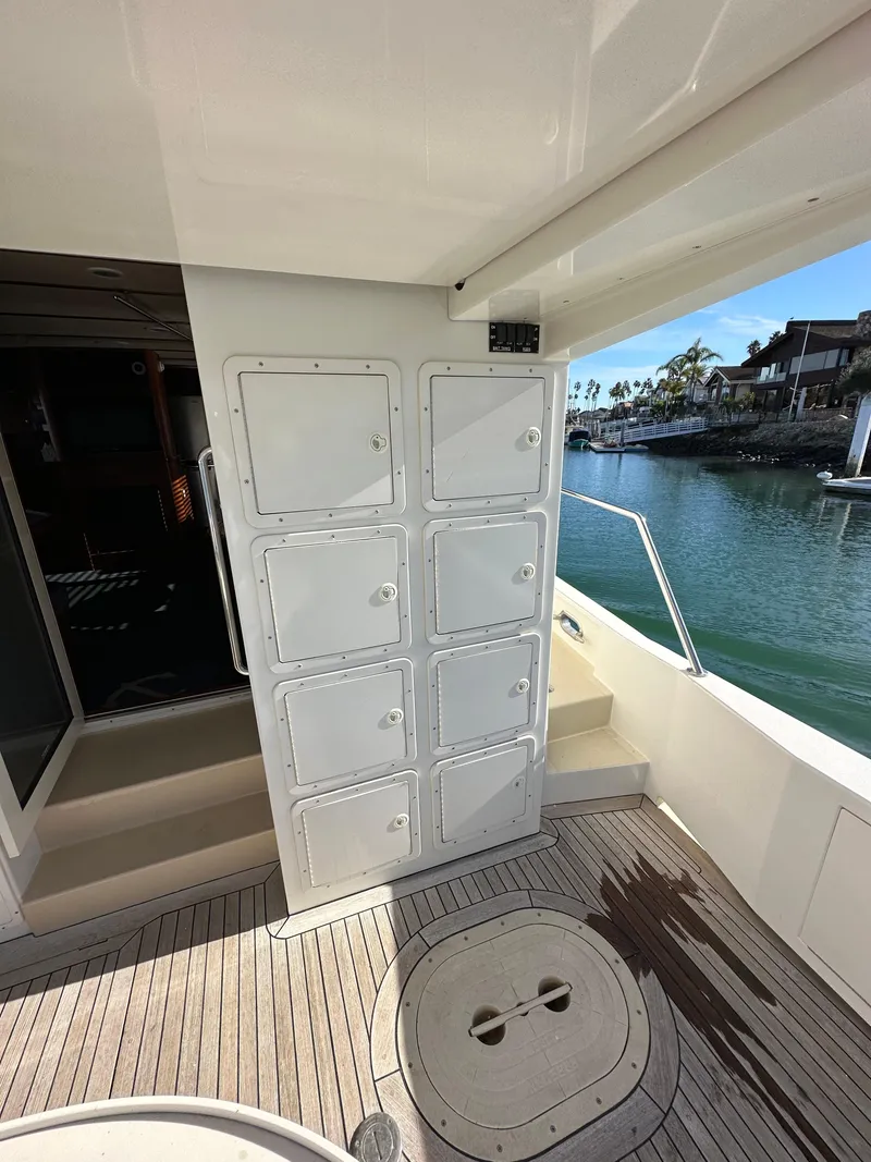 Slide: The Image of 2009 Little Hoquiam 68 Long Range Sportfisher deck with storage compartments. - 18