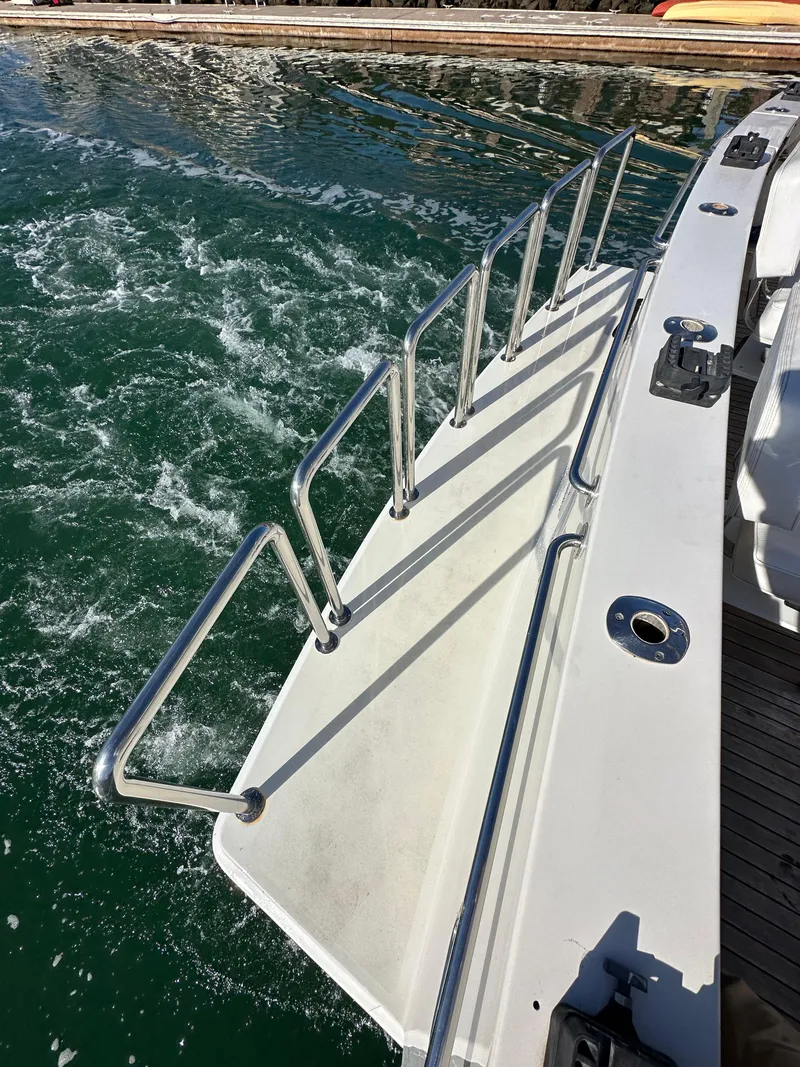 Slide: The Image of 2009 Little Hoquiam 68 Long Range Sportfisher boat deck with stainless steel railings. - 22