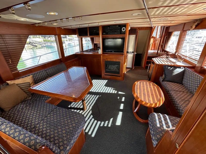 Slide: The Image of Luxurious interior of 2009 Little Hoquiam 68 Long Range Sportfisher yacht with elegant wood finishes. - 23