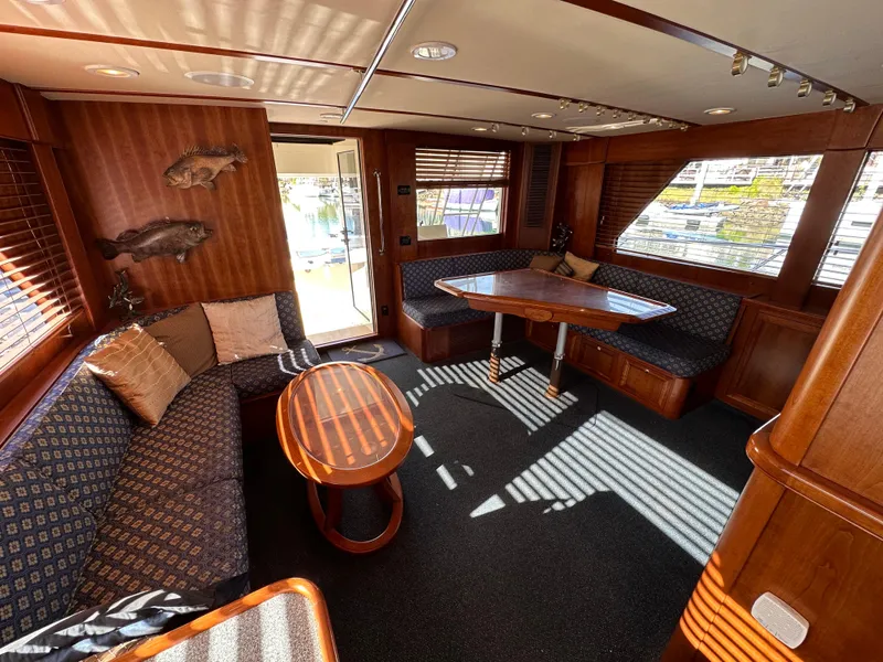 Slide: The Image of Interior of 2009 Little Hoquiam 68 Long Range Sportfisher with wood furnishings and seating area. - 24