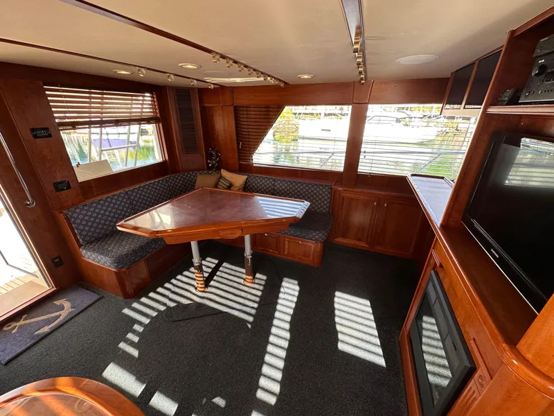 Slide: The Image of Interior of 2009 Little Hoquiam 68 Long Range Sportfisher with dining area and TV. - 25