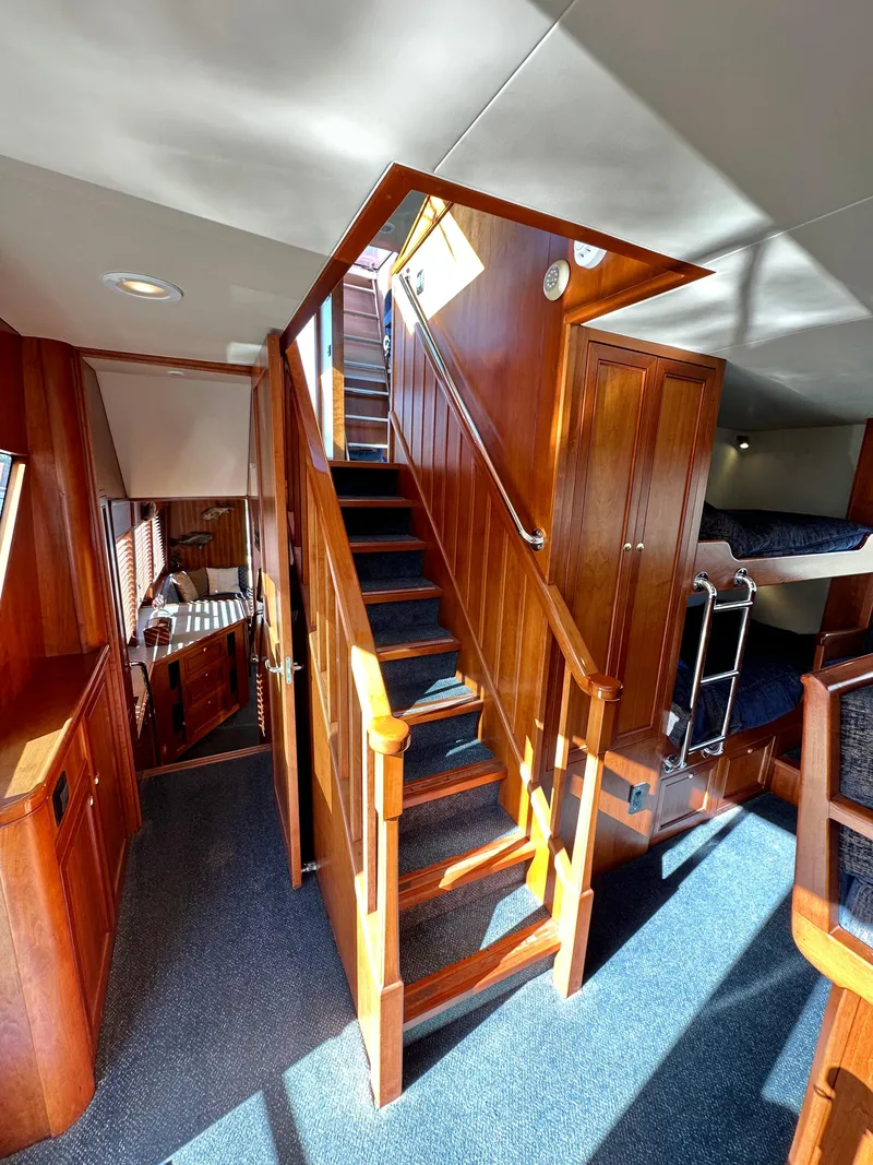 Slide: The Image of Interior of 2009 Little Hoquiam 68 Long Range Sportfisher with wooden stairs and cozy cabin. - 37