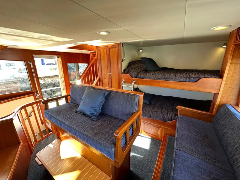 Slide: The Image of Interior of 2009 Little Hoquiam 68 Long Range Sportfisher with bunk beds and seating area. - 39