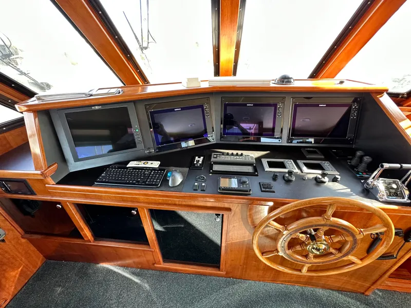 Slide: The Image of Helm station of 2009 Little Hoquiam 68 Long Range Sportfisher with advanced navigation equipment. - 42