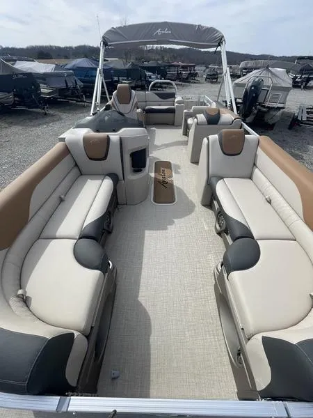Slide: The Image of 2024 Avalon LSZ ELITE pontoon boat with spacious seating and canopy. - 1