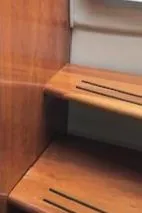 Slide: The Image of Wooden interior steps of a 2004 Doral Intrigue boat. - 6