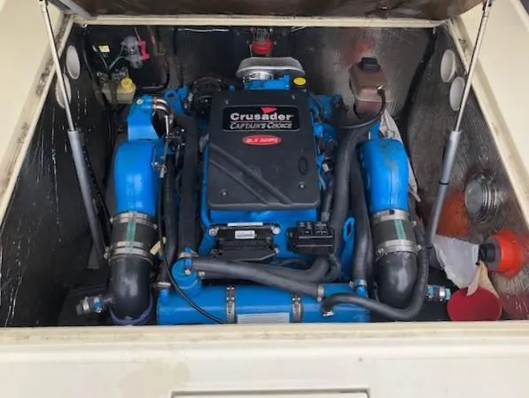 Slide: The Image of Engine compartment of a 2003 Carolina Classic 25 I/O boat with Crusader Captain's Choice engine. - 17