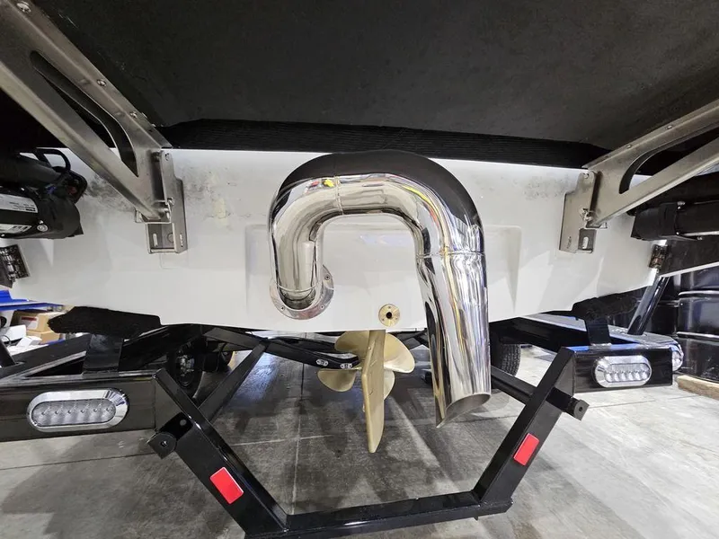 Slide: The Image of 2024 Malibu 21 LX-R boat exhaust and propeller system. - 8