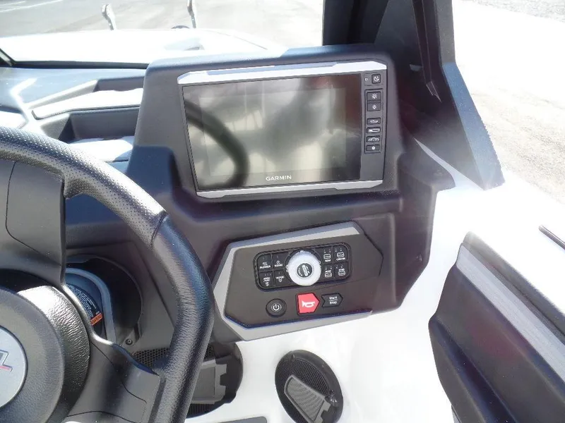 Slide: The Image of 2024 Axis A245 boat dashboard with Garmin display and control panel. - 14