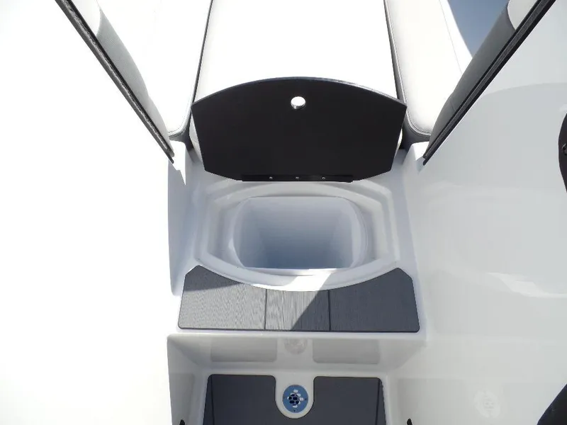 Slide: The Image of 2024 Axis A245 boat interior storage compartment with sleek design. - 19