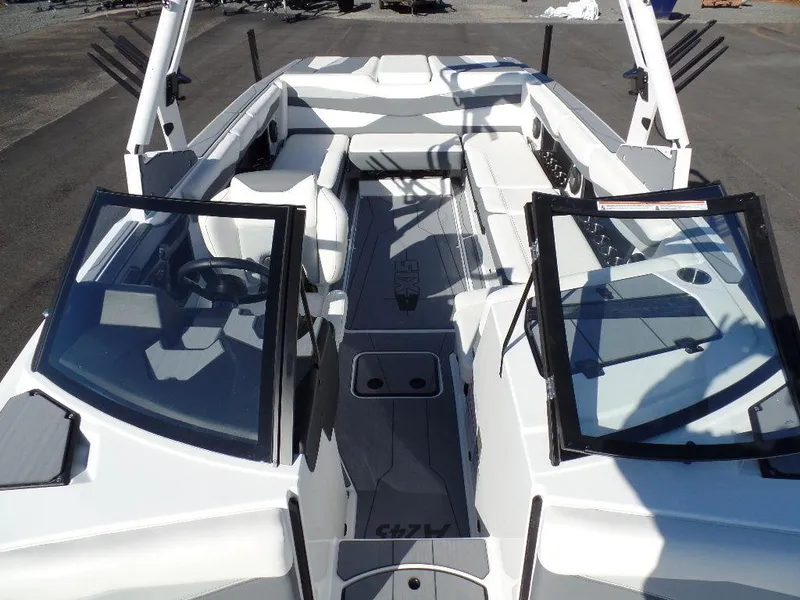 Slide: The Image of 2024 Axis A245 boat interior with sleek design and spacious seating. - 21
