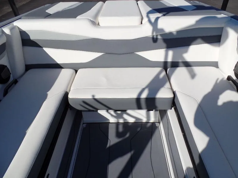 Slide: The Image of 2024 Axis A245 boat interior with white and gray seating, modern design. - 5