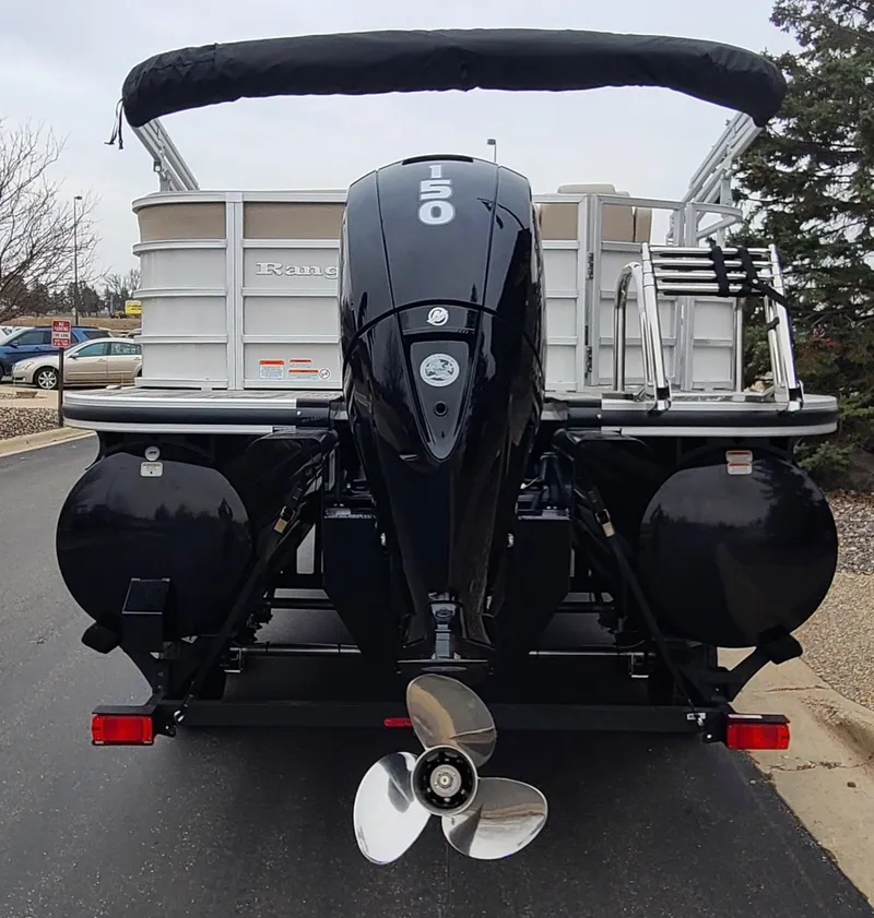 Slide: The Image of 2024 Ranger Reata 223C pontoon boat rear view with outboard motor. - 3