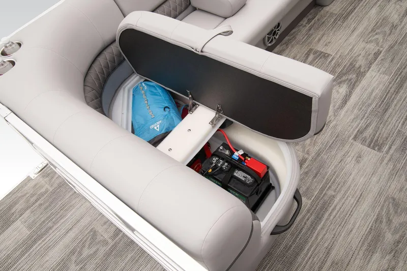 Slide: The Image of 2024 Ranger Reata 223C storage compartment with boating gear and accessories. - 53