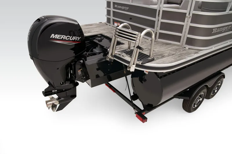 Slide: The Image of 2024 Ranger Reata 223C boat with Mercury outboard motor and trailer. - 56