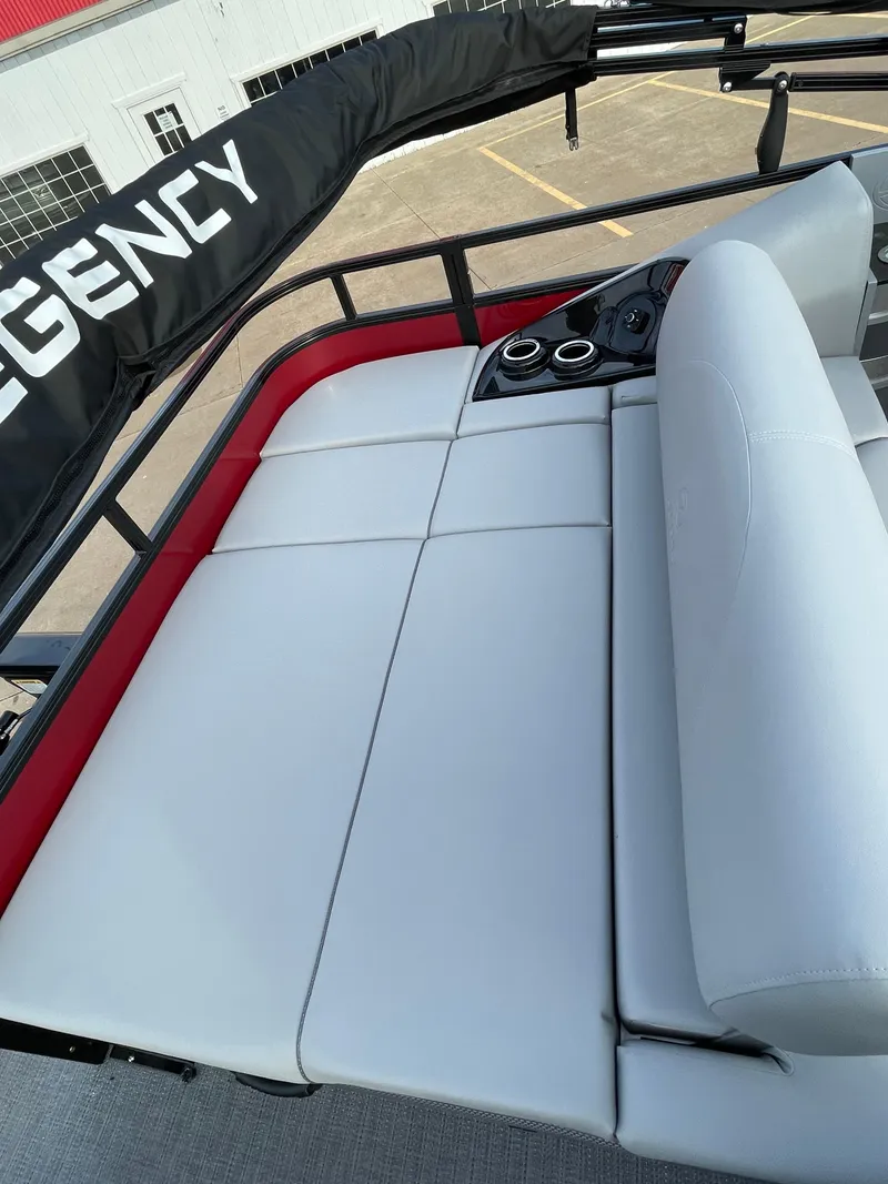 Slide: The Image of 2024 Regency 250 DL3 boat with spacious seating and cup holders. - 3