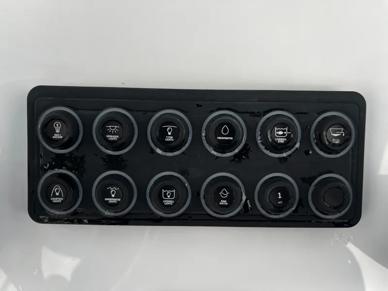 Slide: The Image of Control panel of 2024 Sportsman Open 232 Center Console boat. - 15