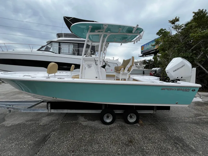 Slide: The Image of 2024 Sportsman Masters 227 Bay Boat on trailer, side view. - 3