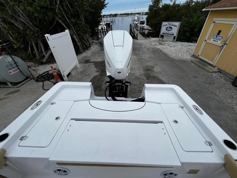 Slide: The Image of 2024 Sportsman Masters 227 Bay Boat at a marina dock. - 9