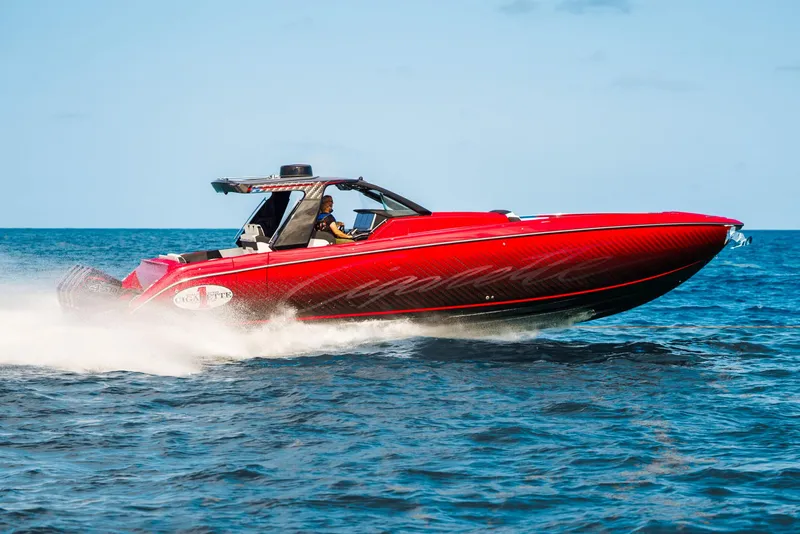 Slide: The Image of Red 2025 Cigarette 42 Auroris speedboat cruising on open water. - 3