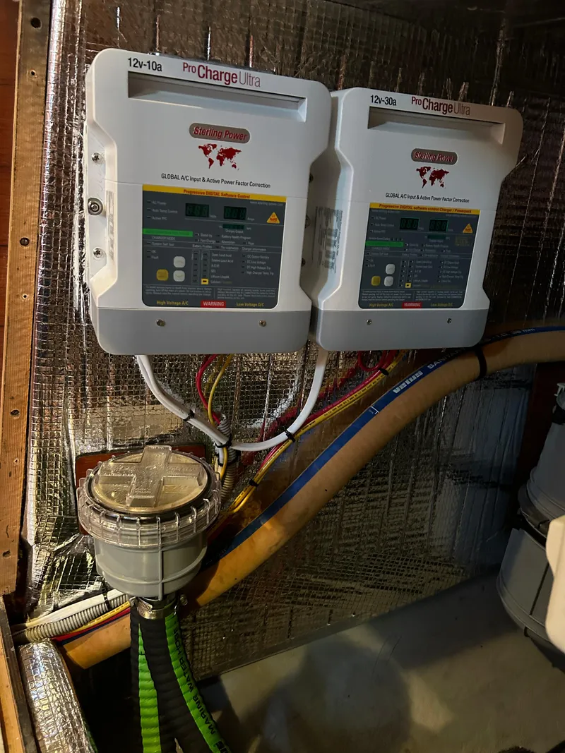 Slide: The Image of Electrical system with ProCharge Ultra chargers in a 1977 Baltic 42 yacht. - 35