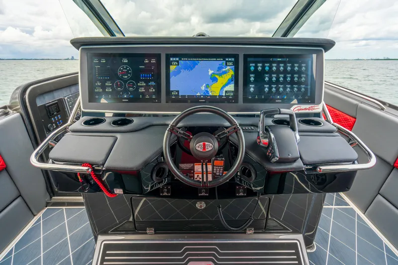 Slide: The Image of 2025 Cigarette 42 Nighteagle boat dashboard with advanced navigation and control systems. - 21