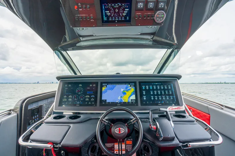 Slide: The Image of 2025 Cigarette 42 Nighteagle boat dashboard with advanced navigation and control systems. - 22