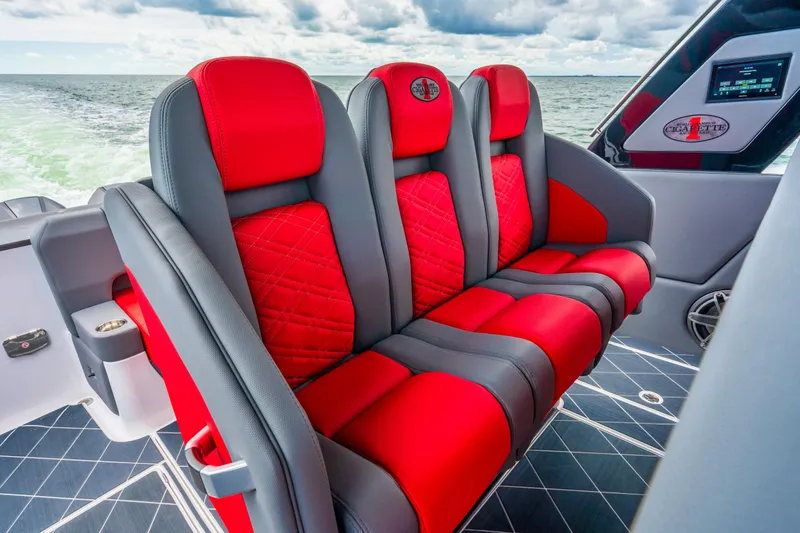 Slide: The Image of Luxurious red and gray seating on 2025 Cigarette 42 Nighteagle boat. - 23