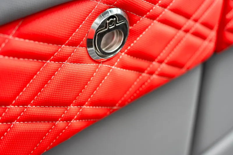 Slide: The Image of Close-up of 2025 Cigarette 42 Nighteagle's red quilted interior detail. - 25
