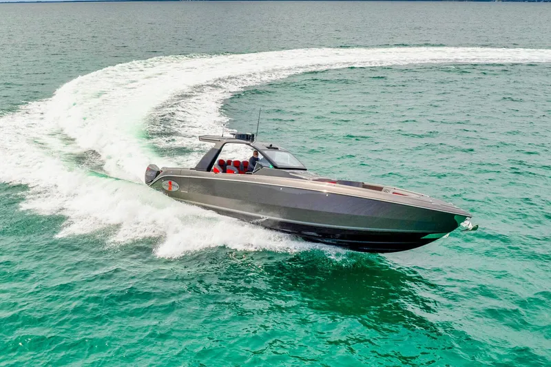 Slide: The Image of 2025 Cigarette 42 Nighteagle speedboat cruising on turquoise waters. - 5