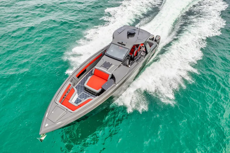 Slide: The Image of 2025 Cigarette 42 Nighteagle speedboat cruising on turquoise water. - 9