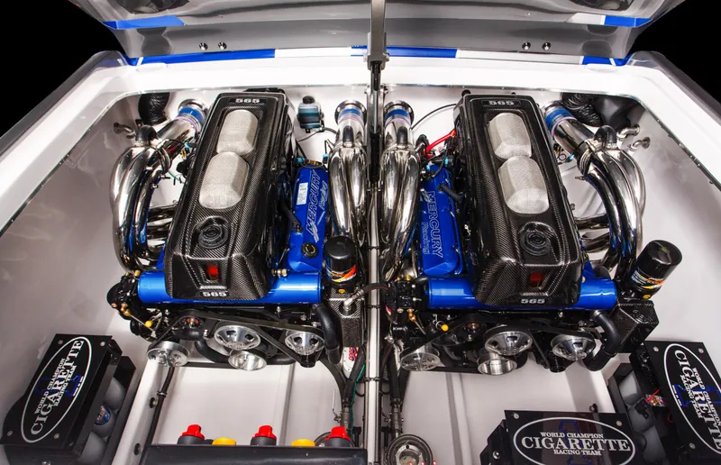 Slide: The Image of 2025 Cigarette 38 Top Gun engine compartment with dual high-performance engines. - 10