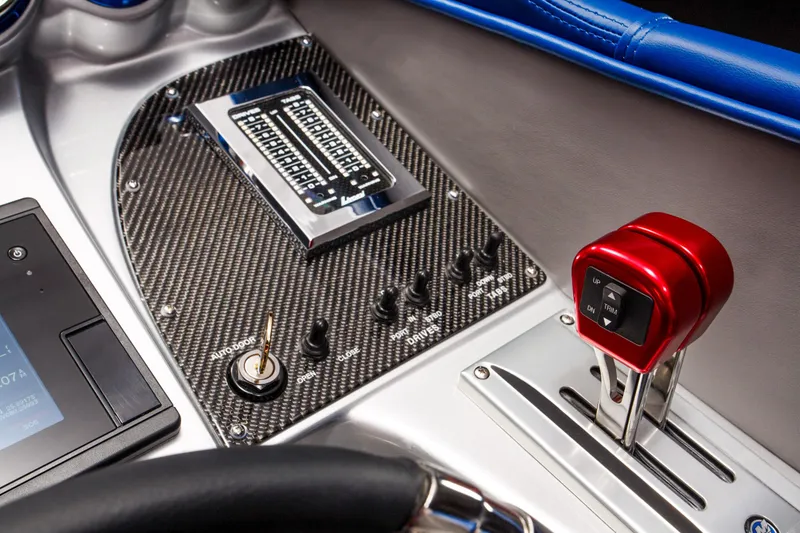 Slide: The Image of Control panel of 2025 Cigarette 38 Top Gun boat with carbon fiber finish. - 14