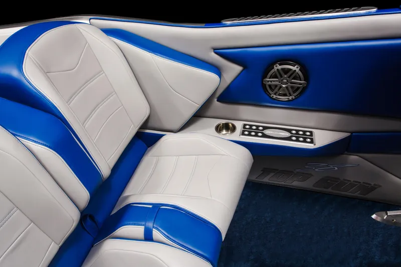 Slide: The Image of Interior of 2025 Cigarette 38 Top Gun boat with blue and white leather seats. - 15