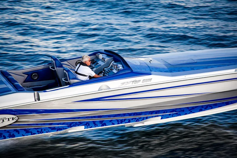 Slide: The Image of 2025 Cigarette 38 Top Gun speedboat cruising on water. - 3